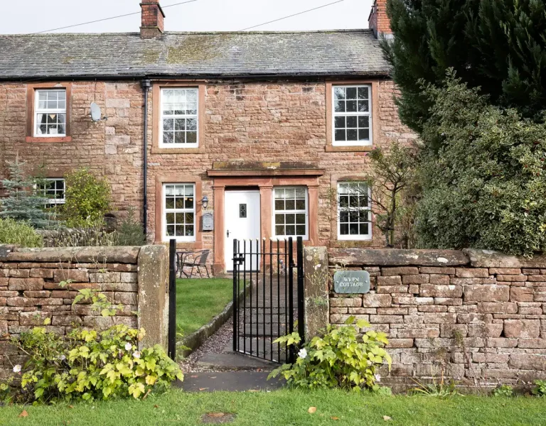 A cosy, traditional red stone Cumbrian cottage